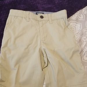 Little boy's tan dressy tan shorts.
